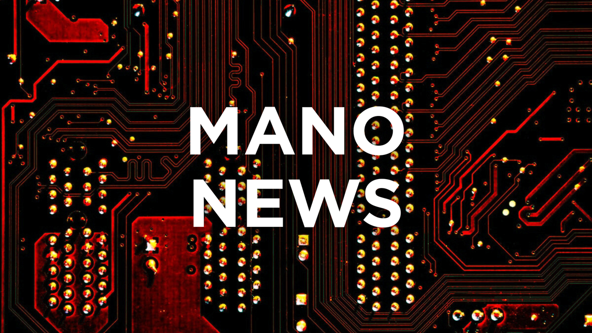 A red and black circuit board with white text that reads: MANO NEWS.