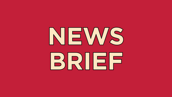 Yellow text on a red background: NEWS BRIEF.